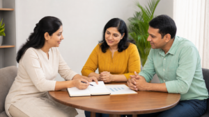 Parent and teacher discussing a student's progress at a table